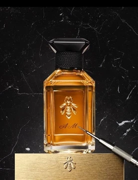 تطوير العلامة التجارية لعطور Guerlain